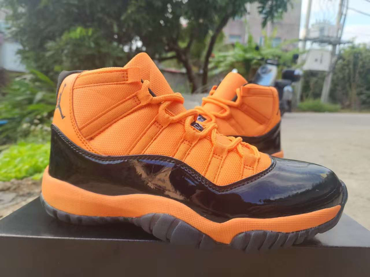 Air Jordan 11 Retro Sneakers – Orange, Red & Black