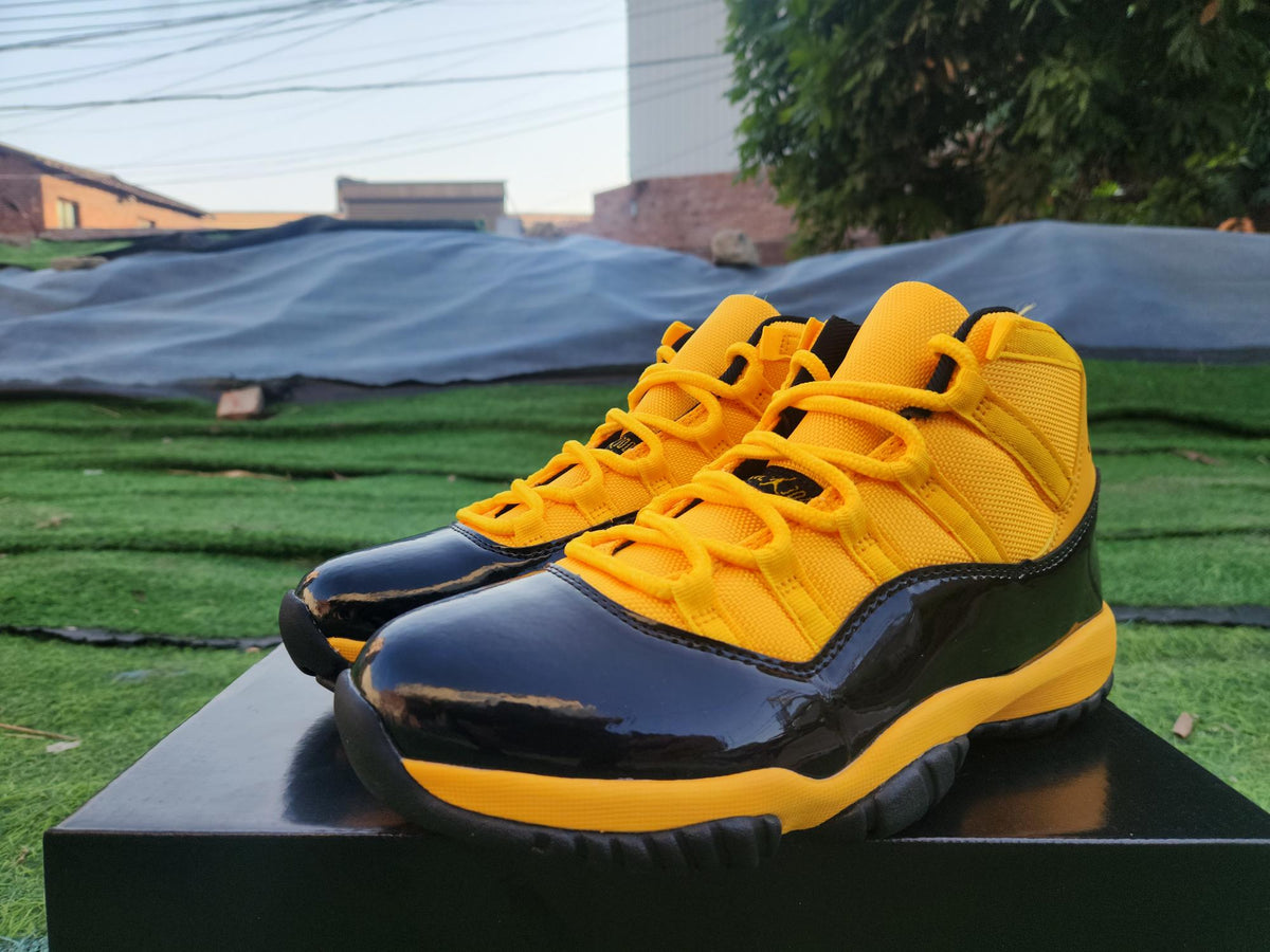 Air Jordan 11 Sneakers – Orange, Yellow & Black