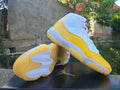 Air Jordan 11 Sneakers – White / Yellow