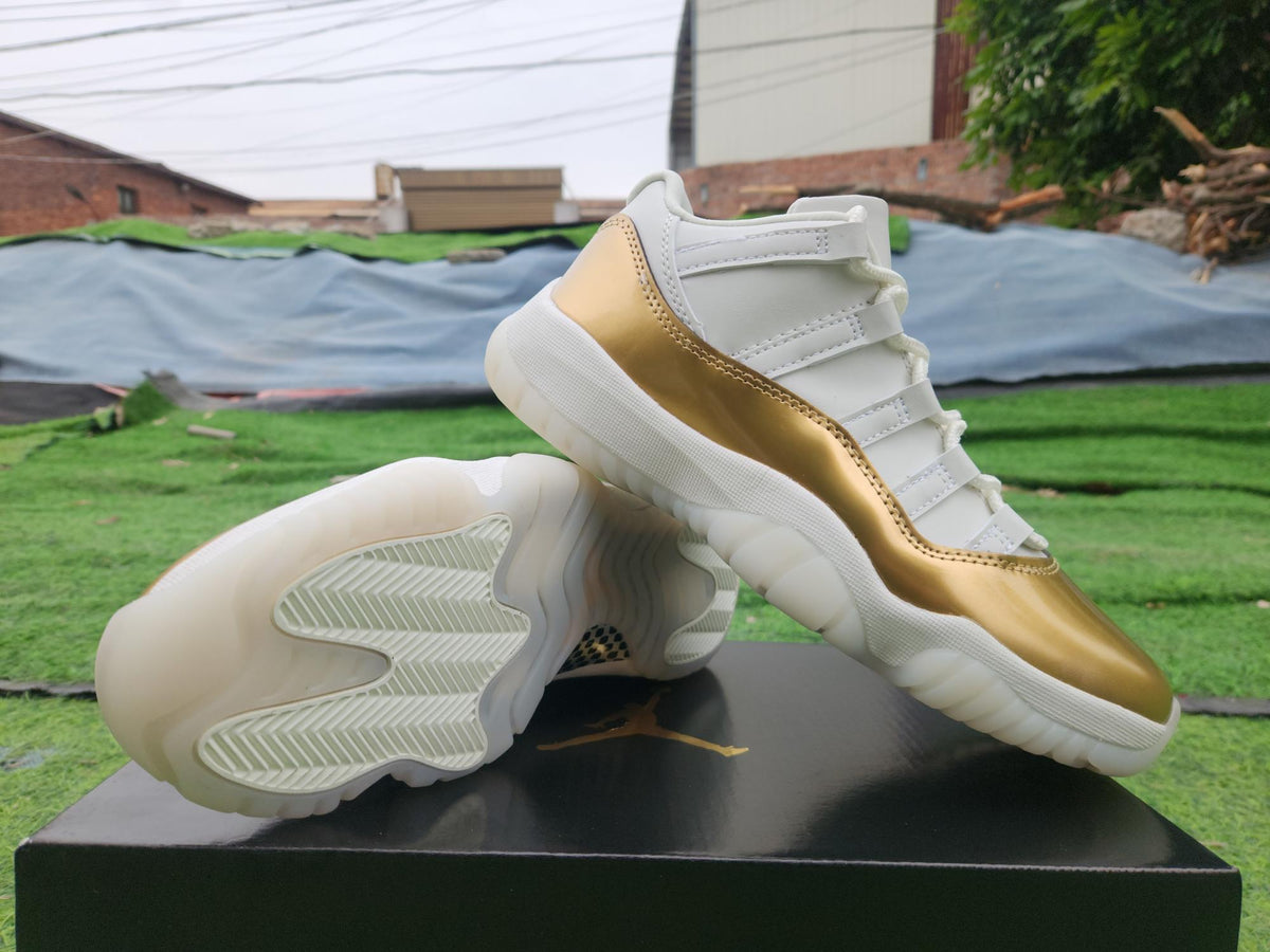 Air Jordan 11 Low Sneakers – White / Gold