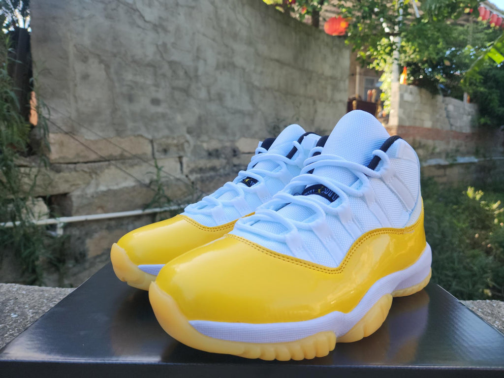 Air Jordan 11 Sneakers – White / Yellow