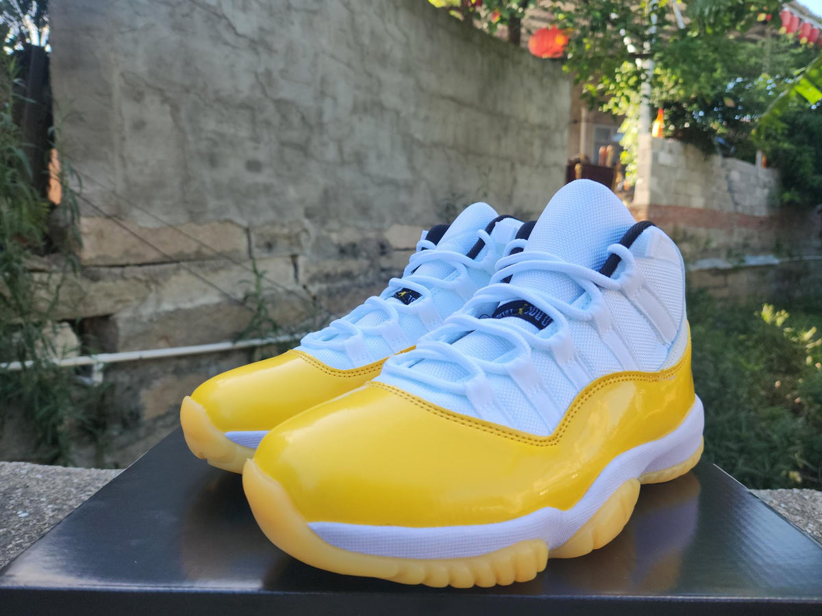 Air Jordan 11 Sneakers – White / Yellow