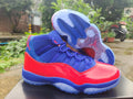 Air Jordan 11 Sneakers – Red & Royal Blue