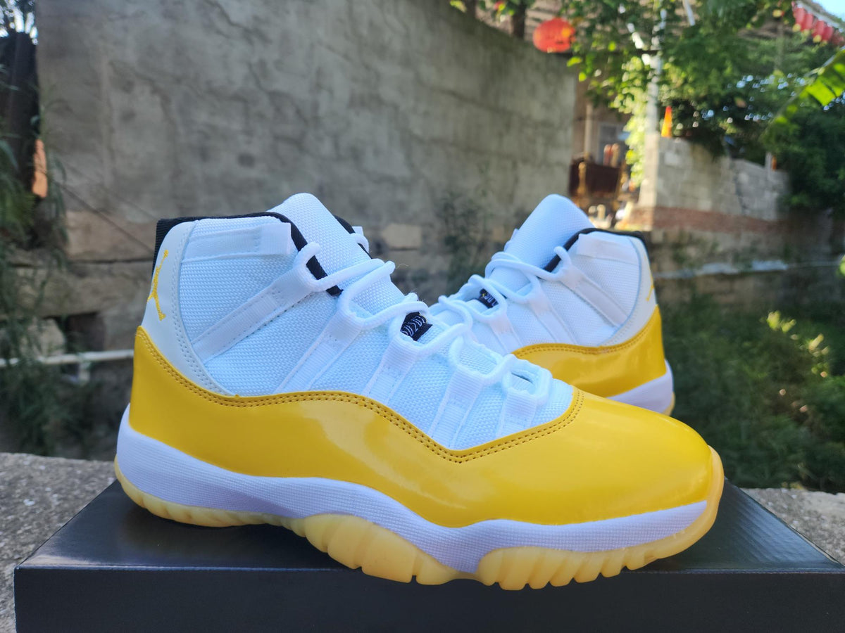 Air Jordan 11 Sneakers – White / Yellow