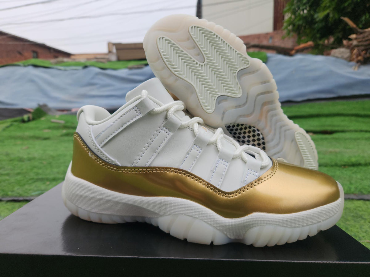 Air Jordan 11 Low Sneakers – White / Gold