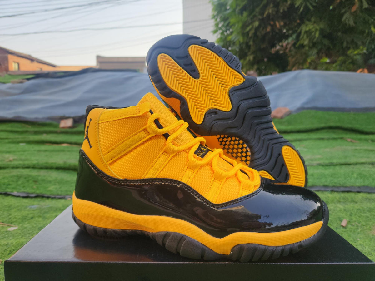 Air Jordan 11 Sneakers – Orange, Yellow & Black